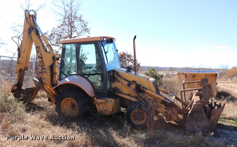 image for item ED9743 1999 New Holland 675 backhoe