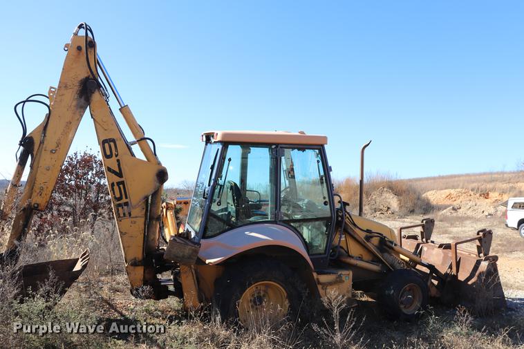image for item ED9743 1999 New Holland 675 backhoe