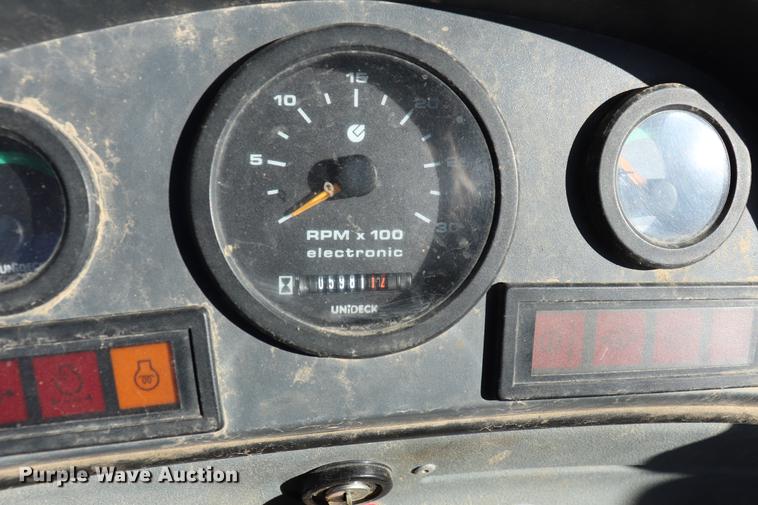 image for item ED9743 1999 New Holland 675 backhoe