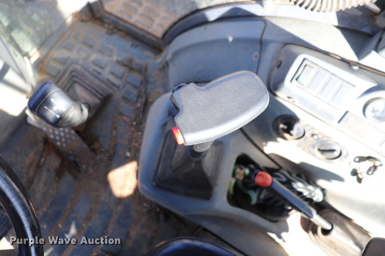 image for item ED9743 1999 New Holland 675 backhoe