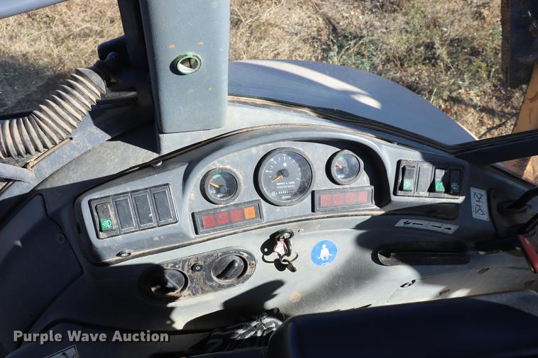 image for item ED9743 1999 New Holland 675 backhoe