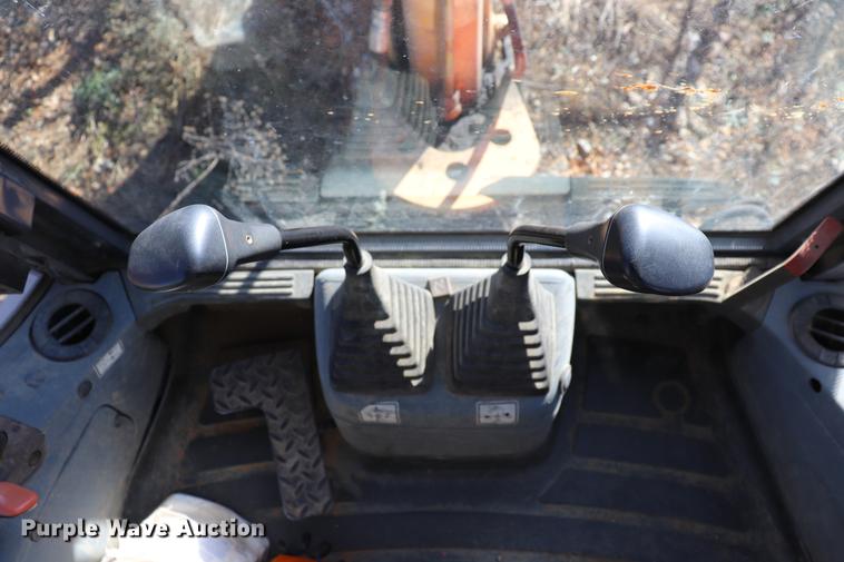 image for item ED9743 1999 New Holland 675 backhoe