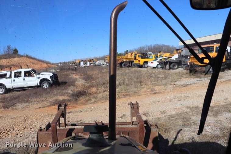 image for item ED9743 1999 New Holland 675 backhoe