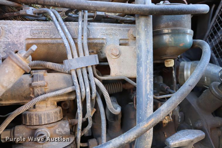 image for item ED9743 1999 New Holland 675 backhoe