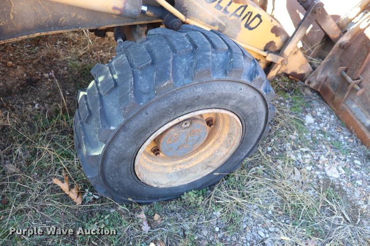 image for item ED9743 1999 New Holland 675 backhoe