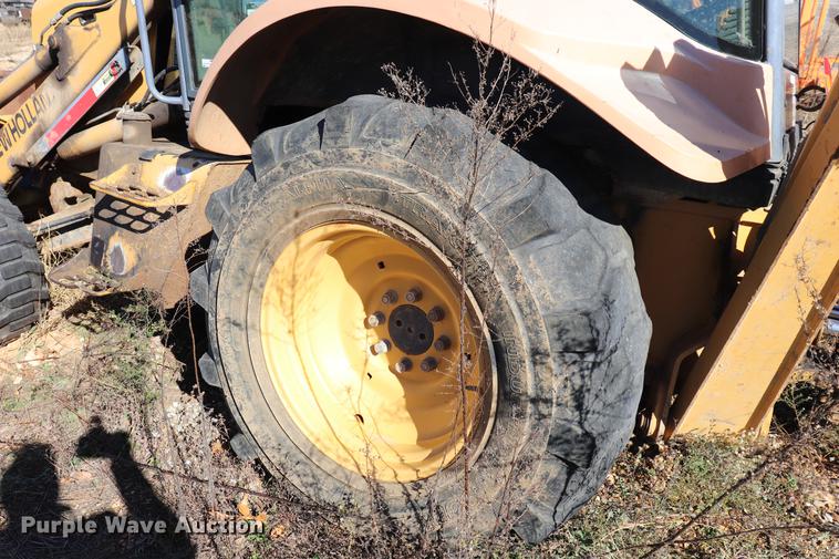 image for item ED9743 1999 New Holland 675 backhoe