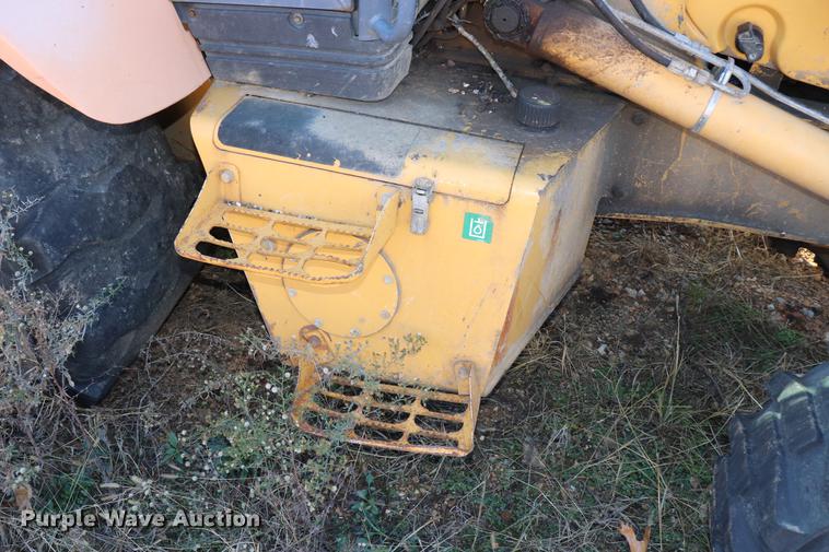 image for item ED9743 1999 New Holland 675 backhoe