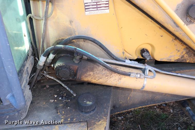 image for item ED9743 1999 New Holland 675 backhoe