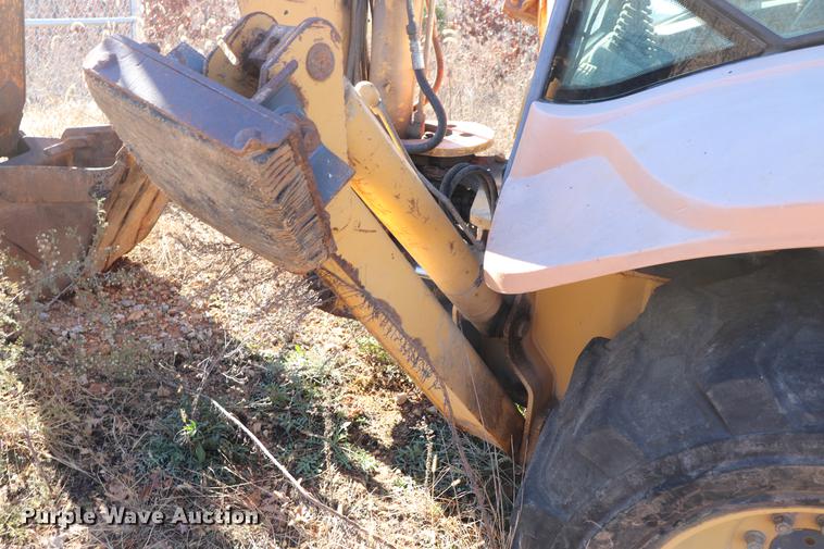 image for item ED9743 1999 New Holland 675 backhoe