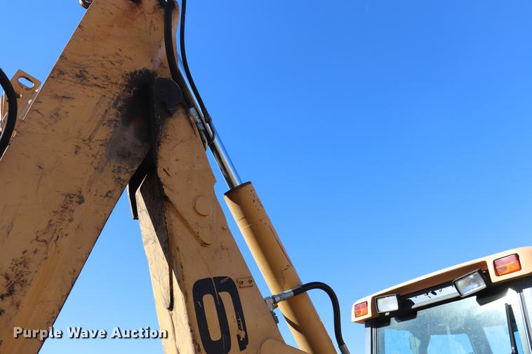 image for item ED9743 1999 New Holland 675 backhoe