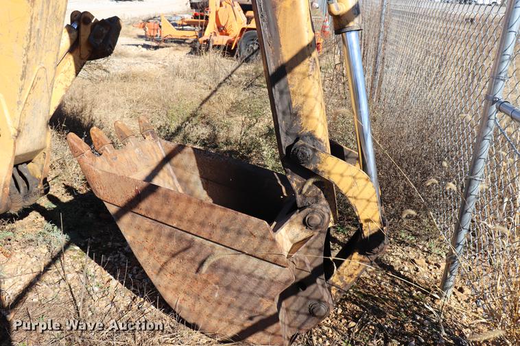 image for item ED9743 1999 New Holland 675 backhoe