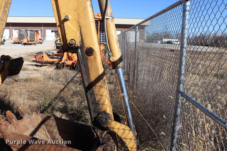 image for item ED9743 1999 New Holland 675 backhoe