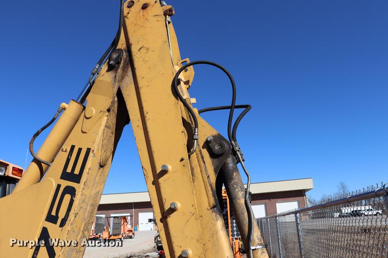 image for item ED9743 1999 New Holland 675 backhoe