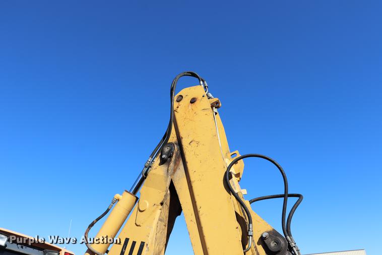 image for item ED9743 1999 New Holland 675 backhoe