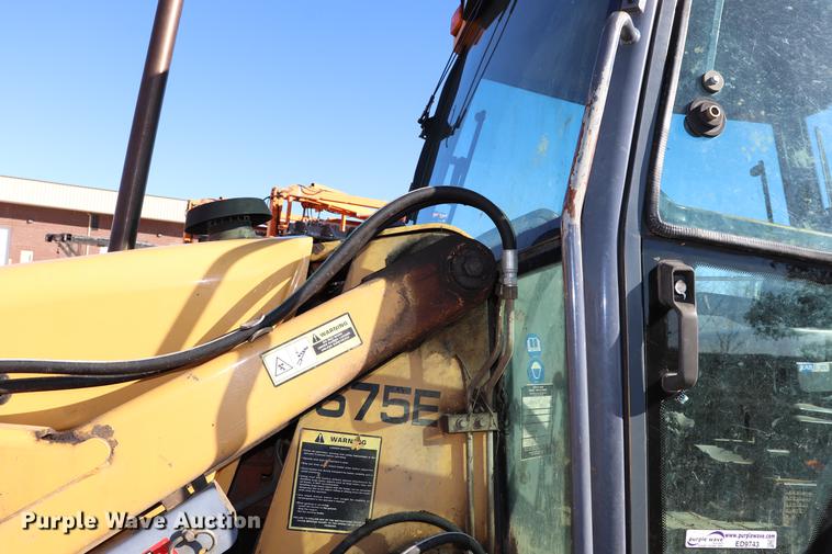 image for item ED9743 1999 New Holland 675 backhoe