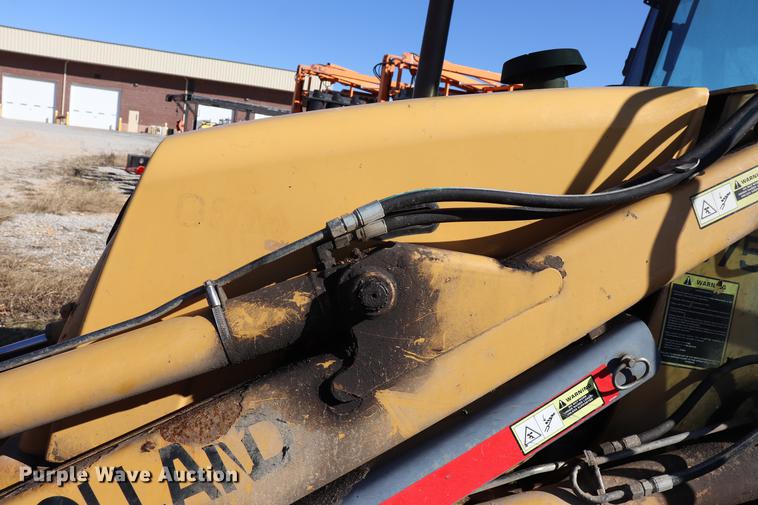 image for item ED9743 1999 New Holland 675 backhoe