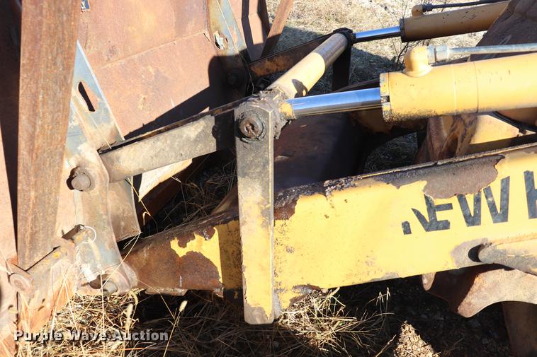 image for item ED9743 1999 New Holland 675 backhoe