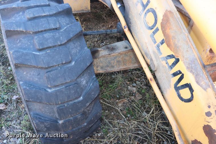 image for item ED9743 1999 New Holland 675 backhoe