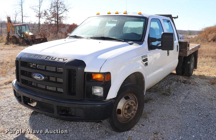 image for item ED9746 2008 Ford F350 Super Duty Crew Cab flatbed pickup truck