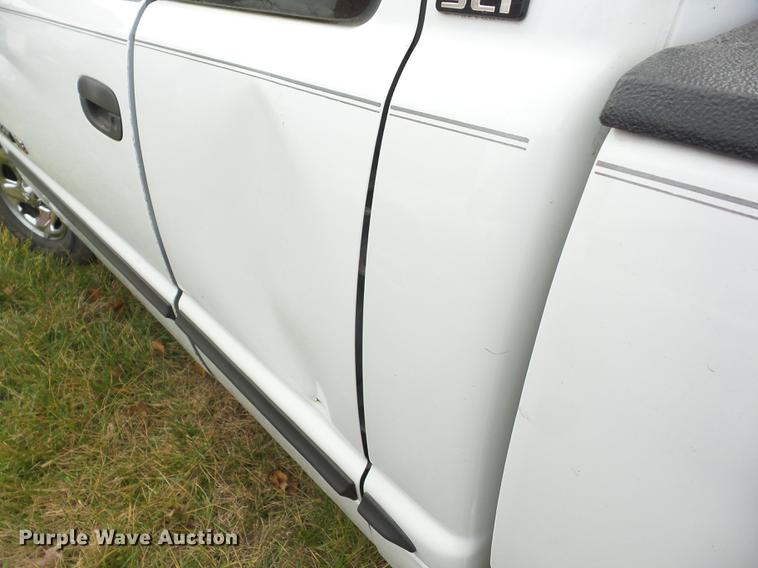 image for item K6309 2000 Dodge Ram 1500 Quad Cab pickup truck