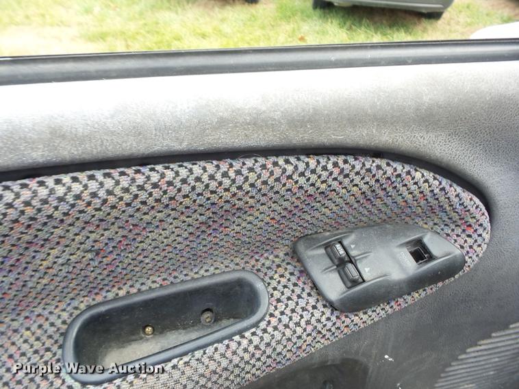 image for item K6309 2000 Dodge Ram 1500 Quad Cab pickup truck