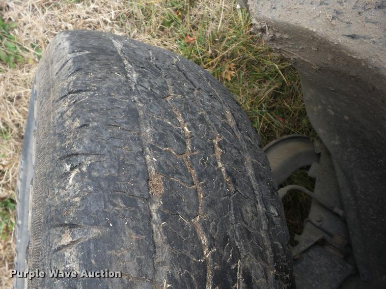 image for item K6309 2000 Dodge Ram 1500 Quad Cab pickup truck