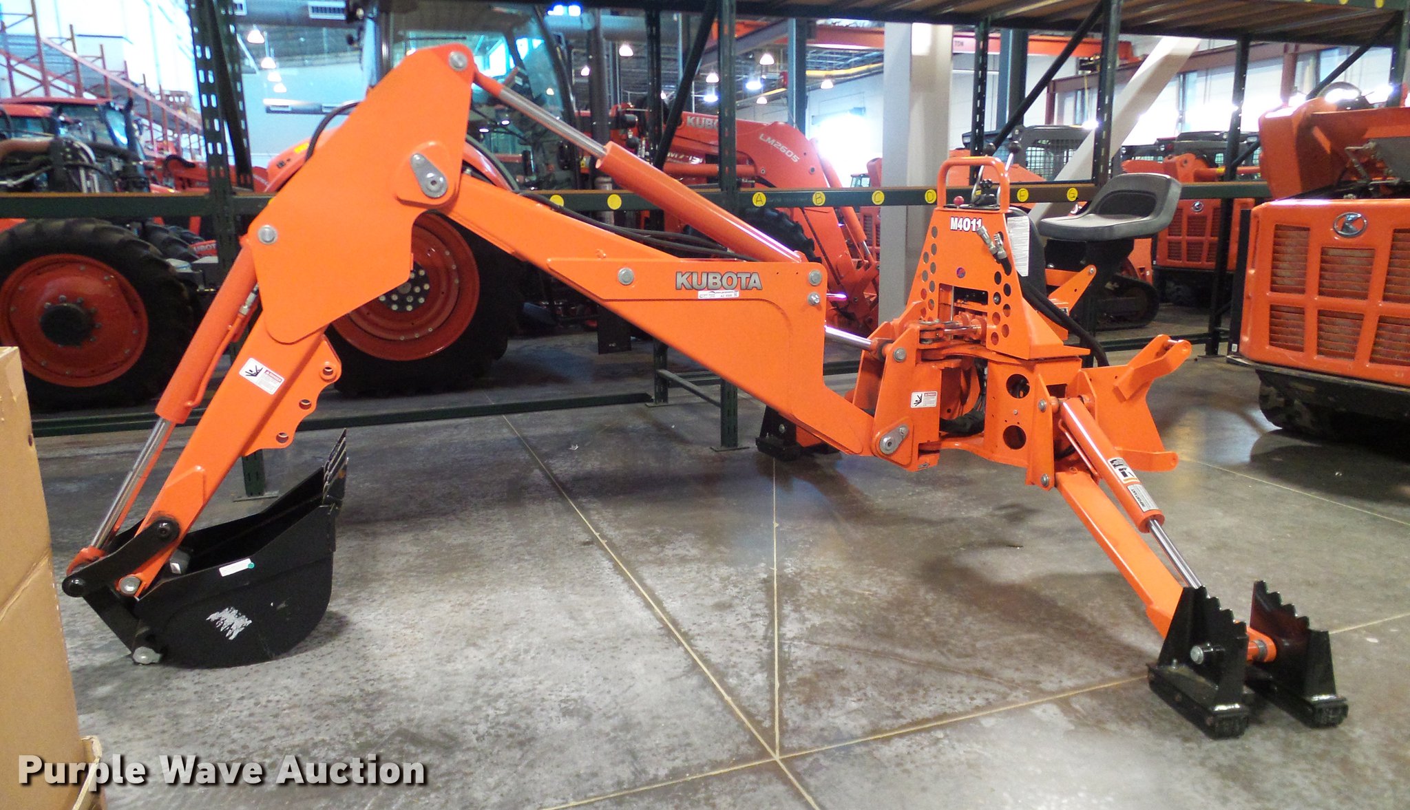 Kubota M4011 backhoe attachment in Grapevine, TX Item AZ9306 sold