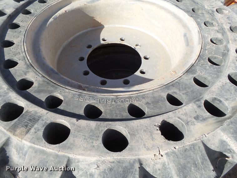 image for item BJ9894 14.00-24/1.00 solid tires