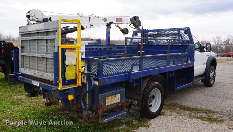 image for item DA1462 2006 Ford F550 utility bed truck with crane
