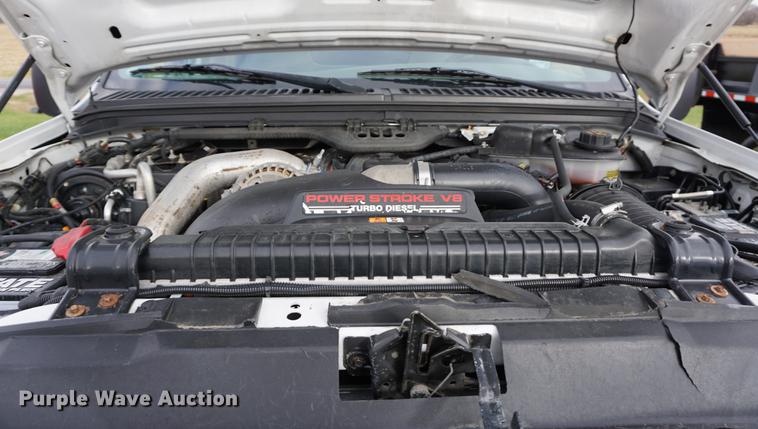 image for item DA1462 2006 Ford F550 utility bed truck with crane