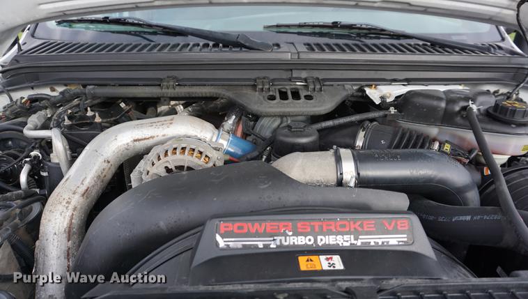 image for item DA1462 2006 Ford F550 utility bed truck with crane