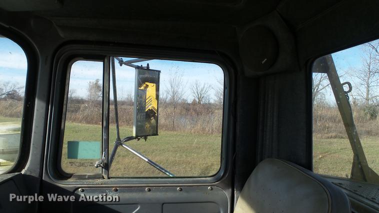 image for item DC1033 1994 Mack RD690S truck with tree spade