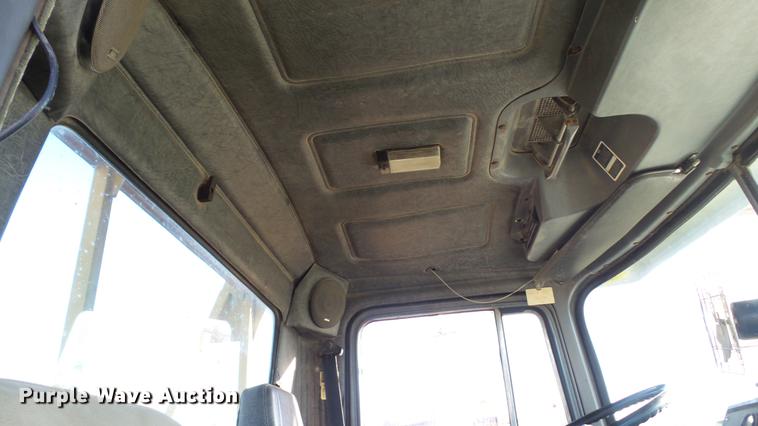 image for item DC1033 1994 Mack RD690S truck with tree spade