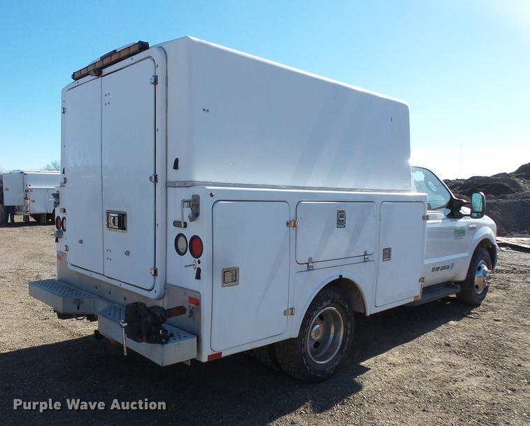 image for item DC1051 2007 Ford F350 Super Duty utility bed pickup truck