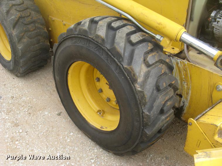 image for item DC2466 2008 John Deere 325 skid steer