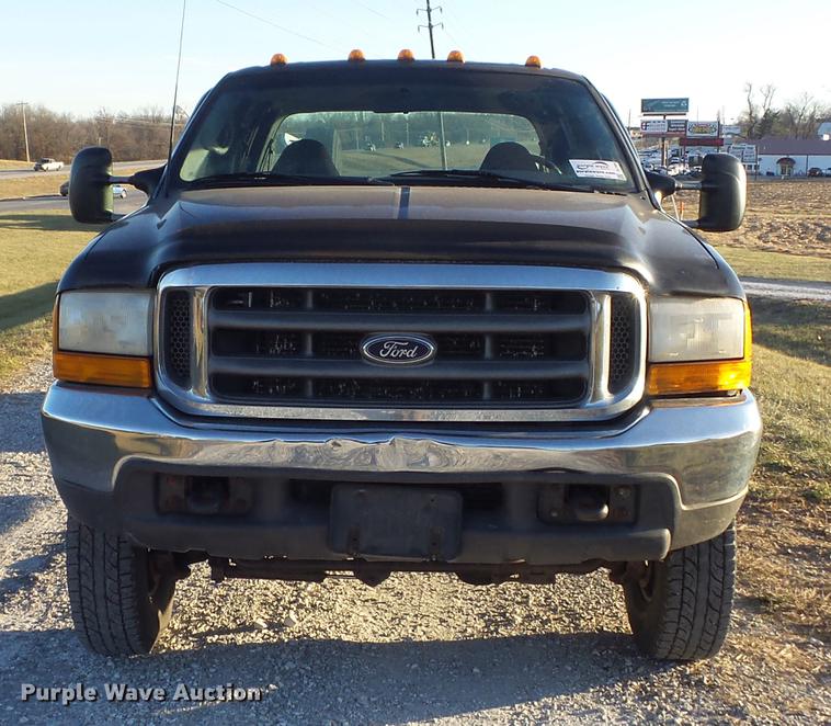 image for item DC7494 1999 Ford F350 Super Duty XLT Crew Cab utility bed pickup truck