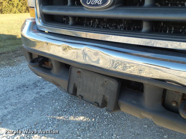 image for item DC7494 1999 Ford F350 Super Duty XLT Crew Cab utility bed pickup truck