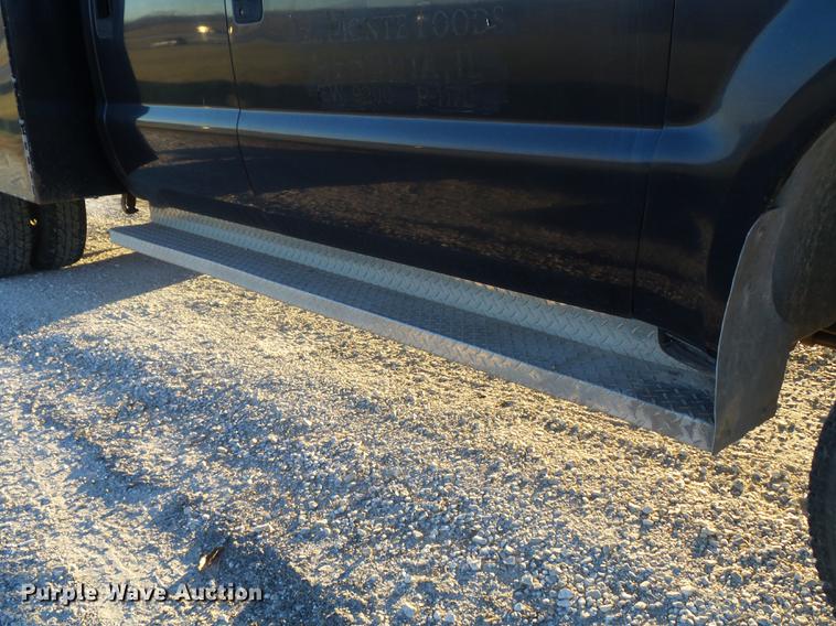 image for item DC7494 1999 Ford F350 Super Duty XLT Crew Cab utility bed pickup truck