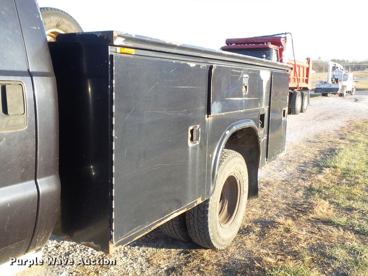 image for item DC7494 1999 Ford F350 Super Duty XLT Crew Cab utility bed pickup truck