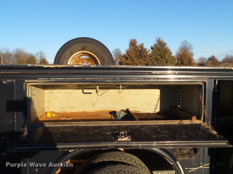 image for item DC7494 1999 Ford F350 Super Duty XLT Crew Cab utility bed pickup truck