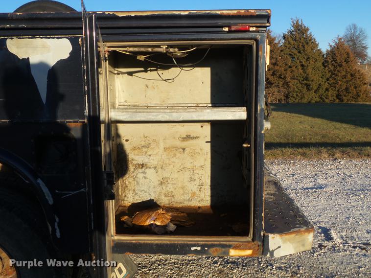 image for item DC7494 1999 Ford F350 Super Duty XLT Crew Cab utility bed pickup truck