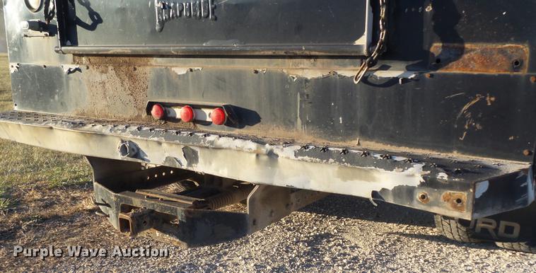 image for item DC7494 1999 Ford F350 Super Duty XLT Crew Cab utility bed pickup truck