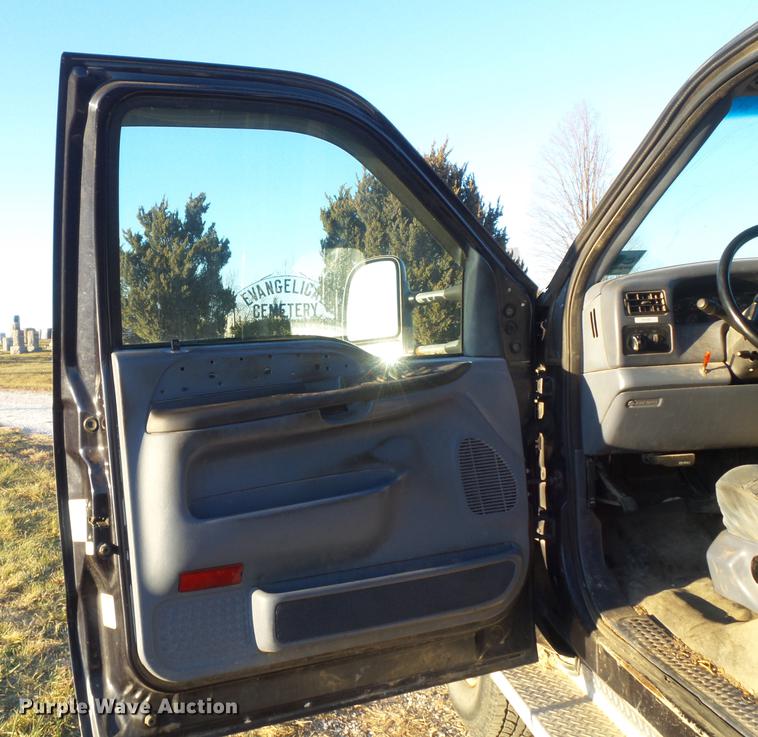 image for item DC7494 1999 Ford F350 Super Duty XLT Crew Cab utility bed pickup truck