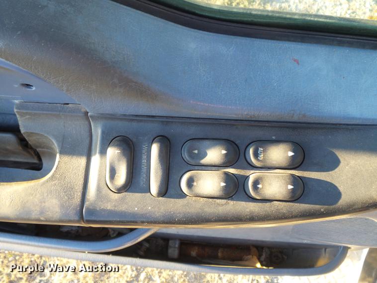 image for item DC7494 1999 Ford F350 Super Duty XLT Crew Cab utility bed pickup truck