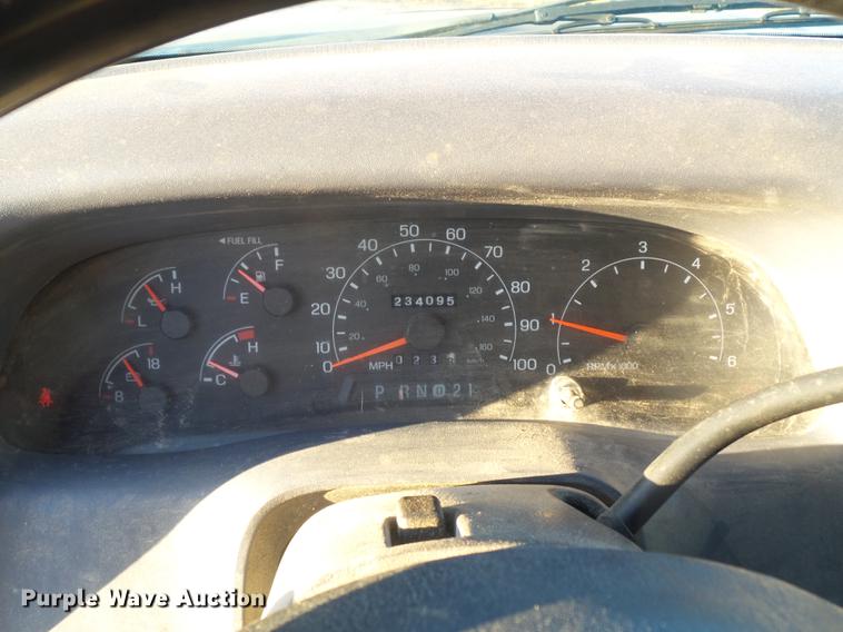 image for item DC7494 1999 Ford F350 Super Duty XLT Crew Cab utility bed pickup truck