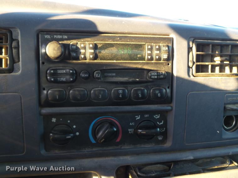 image for item DC7494 1999 Ford F350 Super Duty XLT Crew Cab utility bed pickup truck