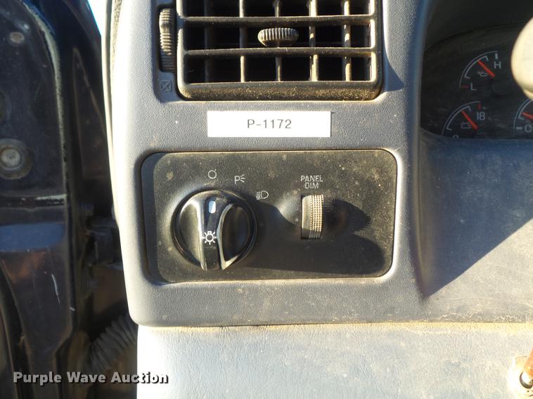 image for item DC7494 1999 Ford F350 Super Duty XLT Crew Cab utility bed pickup truck