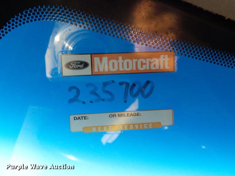 image for item DC7494 1999 Ford F350 Super Duty XLT Crew Cab utility bed pickup truck