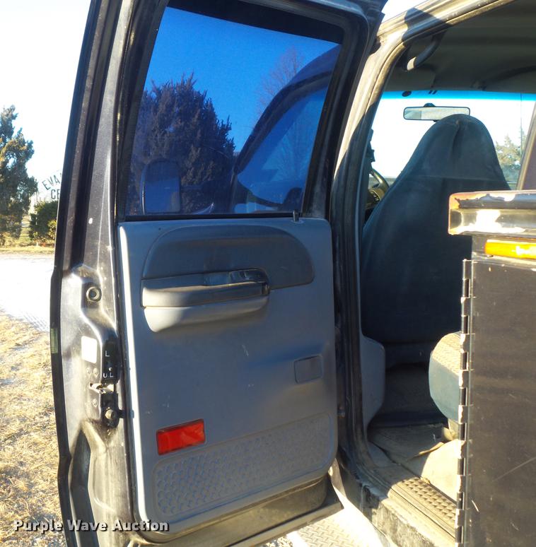 image for item DC7494 1999 Ford F350 Super Duty XLT Crew Cab utility bed pickup truck