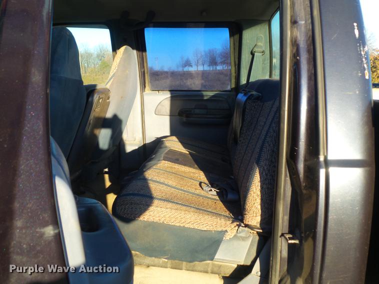 image for item DC7494 1999 Ford F350 Super Duty XLT Crew Cab utility bed pickup truck